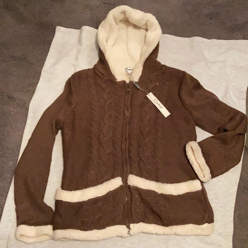 A sweater/jacket...NWT
